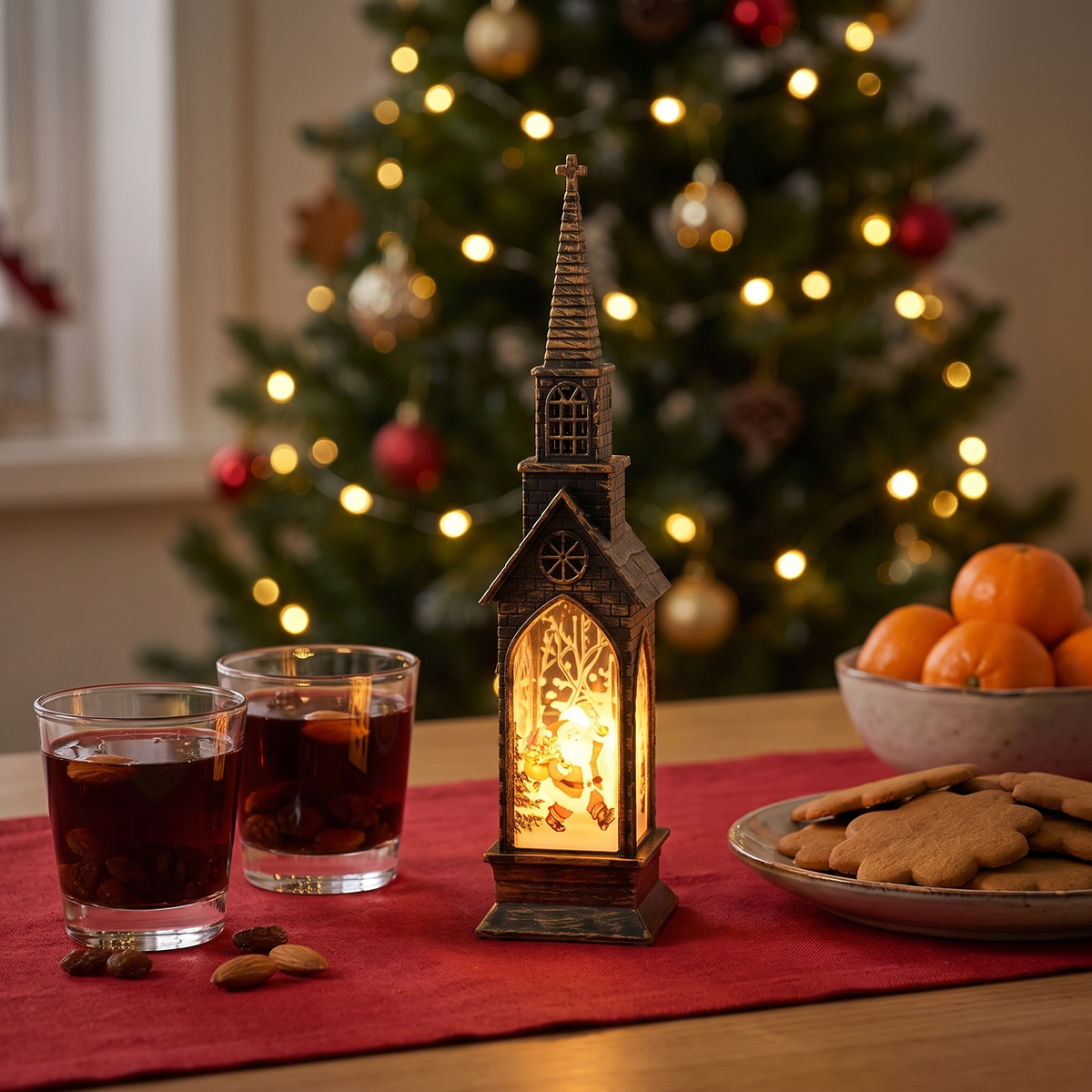 Vesper tänd mitt på julbordet bredvid glögg och pepparkakor