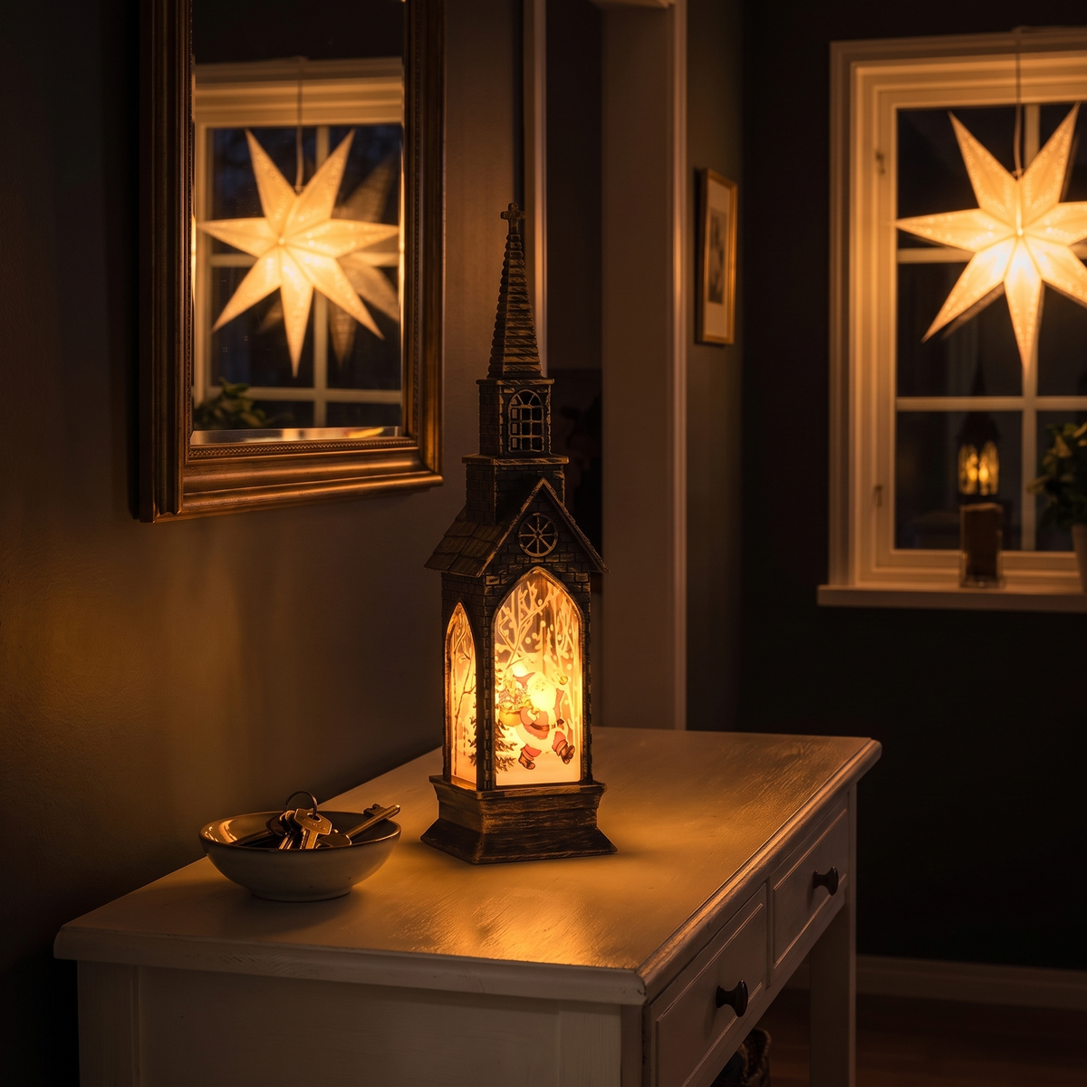 Vesper tänd på en vit konsol i en mörk hall, en adventsstjärna lyser i fönstret